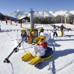 Foto: Touristische Unternehmungen Grächen AG, Skikarusssell im  SISU Schneepark